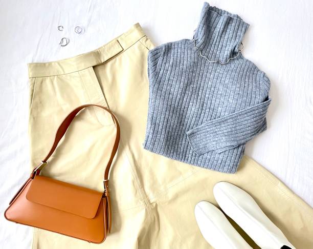 istock gray turtleback sweater and leather skirt 1459964232