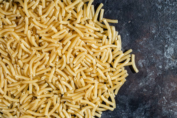 istock Raw pasta close-up. Pasta background 1459967432