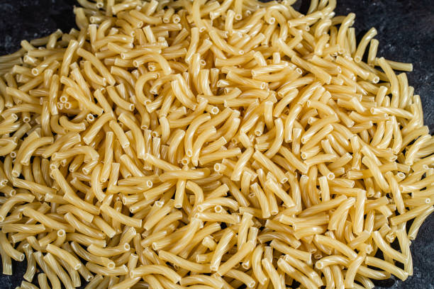 istock Raw pasta close-up. Pasta background 1459967474