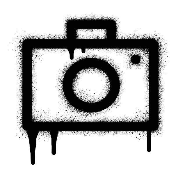 Camera photography graffiti icon with black spray paint. Vector illustration Camera photography graffiti icon with black spray paint. Vector illustration natural pattern photos stock illustrations