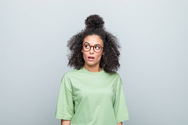 istock Portrait of a surprised young women 1459968607