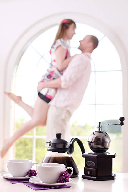 Couple in love at home / focus on the  coffee stock photo