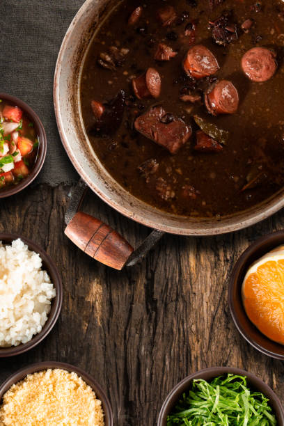 feijoada. brazilian traditional food. top view - food high angle view table stew imagens e fotografias de stock