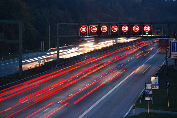 istock night traffic on german autobahn with speed limit signs 145997179