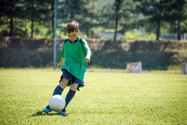 istock Summer soccer football camp school for children, training. 1459973821