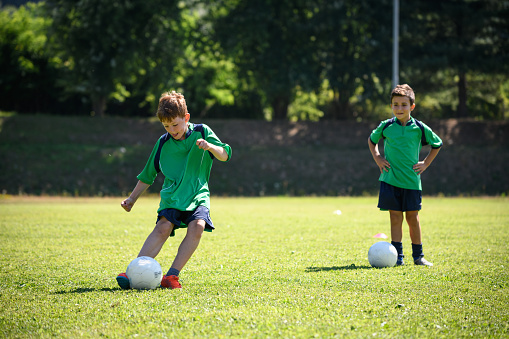 Summer soccer football camp school for children, training.