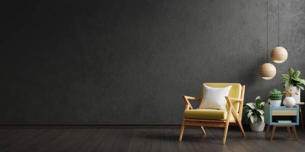 istock Dark room with yellow armchair on black wall background. 1459975306