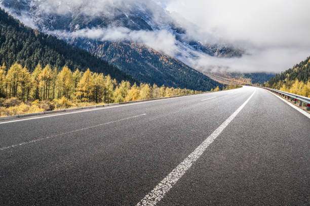 istock Mountain Road in Autumn 1459975638