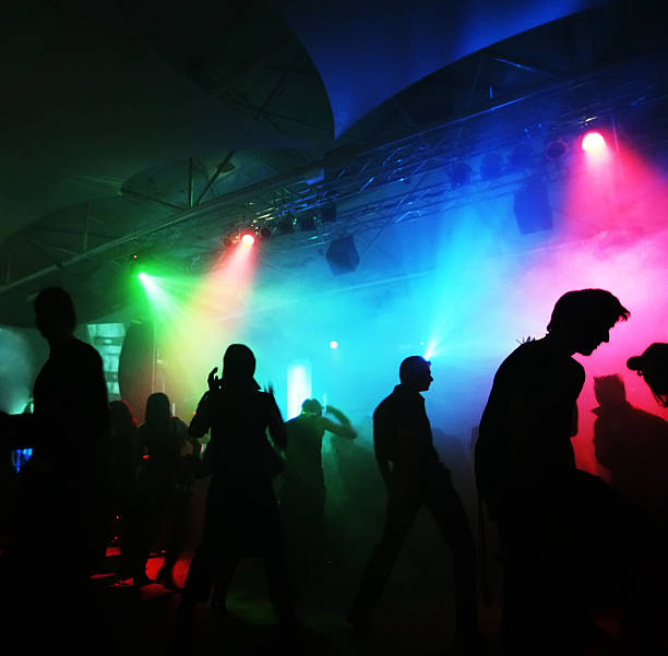 istock Dancing people in an underground club 145997720