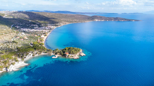 istock Manal Bay, which is connected to zmir, is a peaceful and quiet resting area with its deep blue sea in Mordoan Karaburun. Aerial view with drone. Izmir - Turkey 1459979527