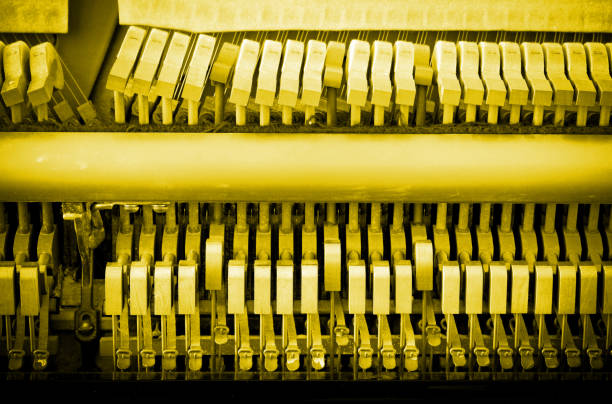 istock Details of piano mechanism gavel - string, pins and hammers 1459979570