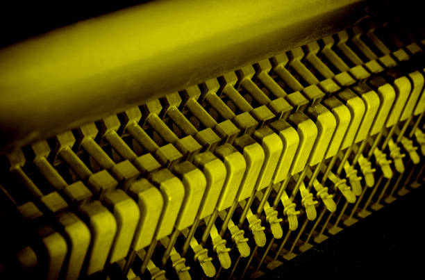 Details of piano mechanism gavel - string, pins and hammers