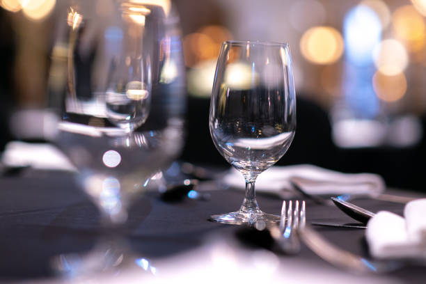 istock empty wine glasses on table in banquet fine dining room 1459985253