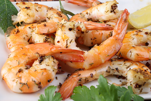 salad or apetizer with shrimp,coconut,avocado mango and herbs