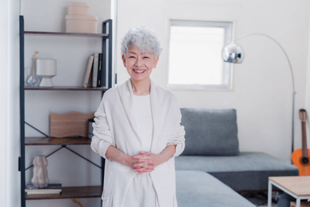 istock Senior woman looking at the camera with a smile 1459991812