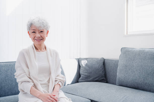istock Senior woman looking at the camera with a smile 1459991867