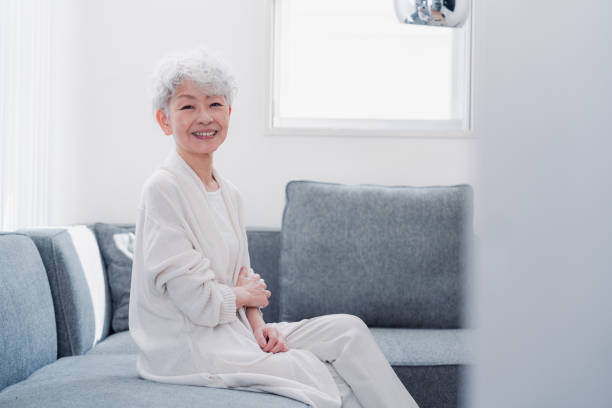 istock Senior woman looking at the camera with a smile 1459991937