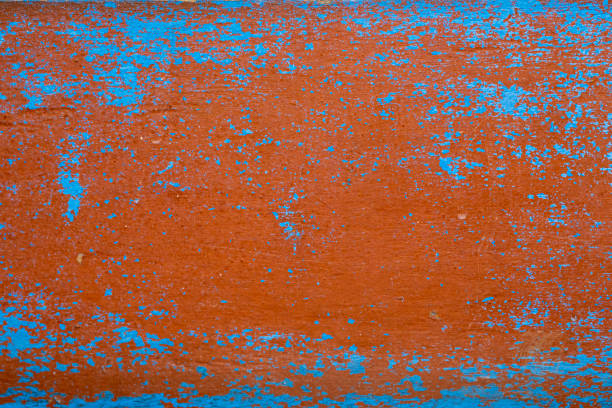 Chipped all over blue and red painted wood. Background and wallpaper texture