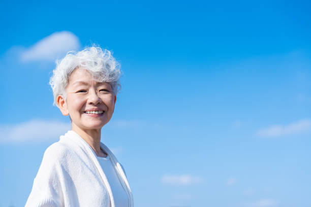 istock Senior woman looking at the camera with a smile 1459992007