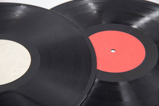 istock Black vinyl records isolated on white background 1459992280