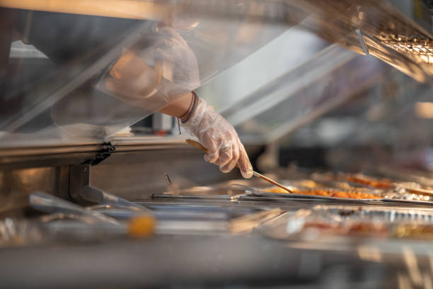 istock Cooked food in trays in supermarket 1459992452