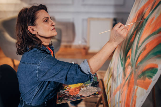 istock Female artist painting 1459993318