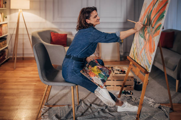 istock Female artist painting 1459993425