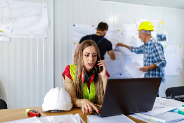 istock A Senior Construction Worker is Analyzing Project Plans with Young Coworkers. 1459995144