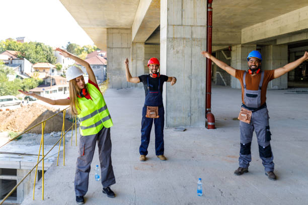istock A Group of Multicultural Workers are Exercising During a Work and Stretching a Muscles. 1459995201
