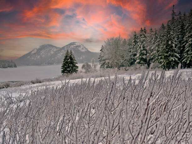 Winter Sunset at Jordan Pond, Acadia National Park Winter Sunset at Jordan Pond, Acadia National Park maine landscape new england sunset stock pictures, royalty-free photos & images