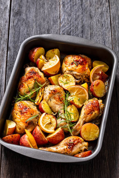 istock Lemon Garlic Chicken with roast potatoes, top view 1459998314