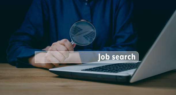 istock job search concept, man browsing work opportunities online using job search computer app. find your career, man looking at online website by laptop computer. 1459999752