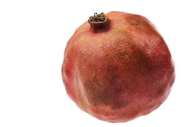 single pomegranate stock photo