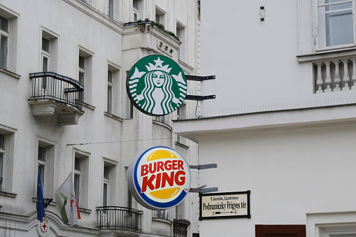 Exterior view of Burger King and Starbucks branch in  Budapest , Hungary on December 22, 2022.
