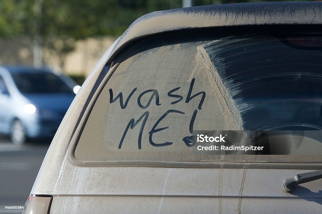 Dirty Car Window Dirty car window and wash me sign. Shallow depth of the field. Car Stock Photo