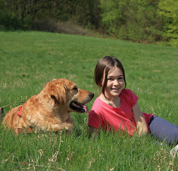 Girl with dogs in park