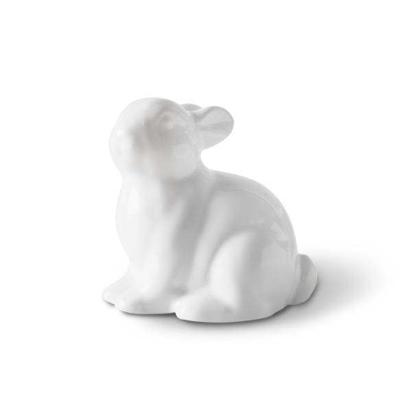 Easter white porcelain bunny isolated on white background.