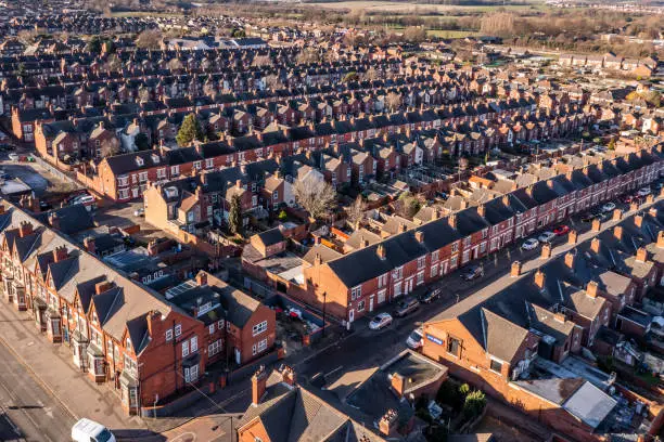 Photo of Aerial view of the rooftops of a block of back to back terraced houses in the North of England