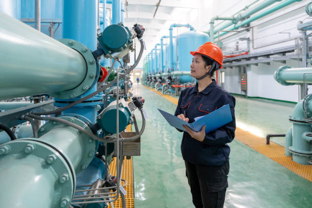 istock A female technician records in a notebook in a chemical plant 1460009851