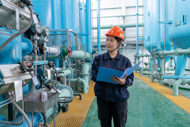 istock A female technician records in a notebook in a chemical plant 1460009855