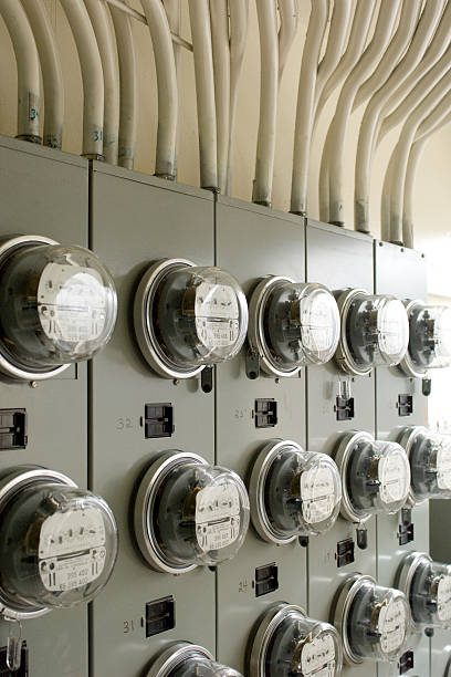 istock Rows of electricity meters on silver panels 146001096