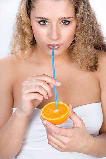 istock Gorgeous young woman with orange 146001550