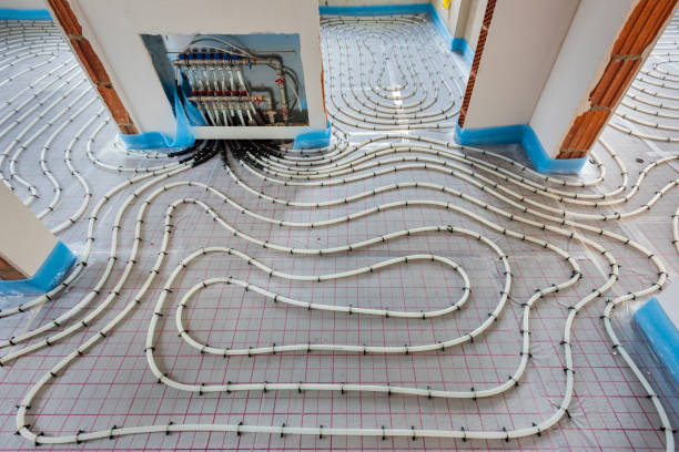 underfloor heating system in construction of new residential house stock photo