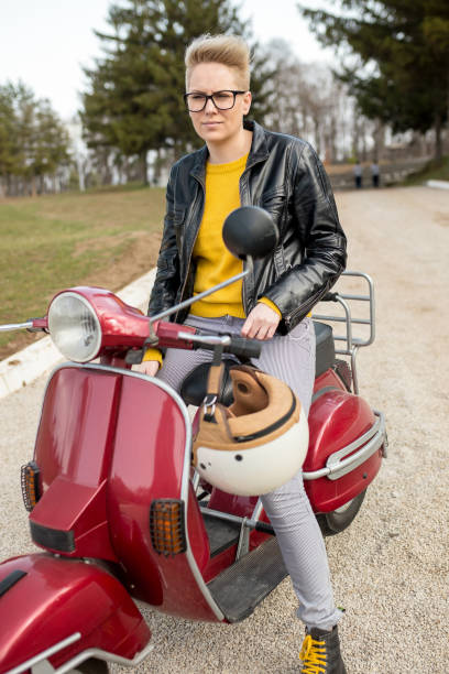 istock Urban girl on vespa 1460017085