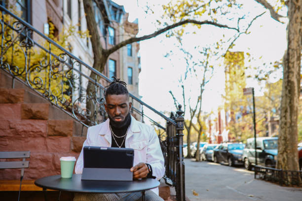 istock freelancer doing work in a cafe in Brooklyn, NYC 1460023519