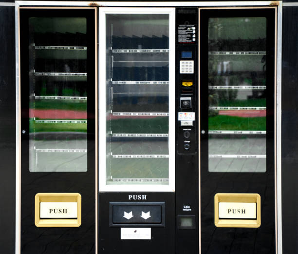 istock A newly installed vending machine, not yet filled with products. Empty display case of the vending machine 1460023531