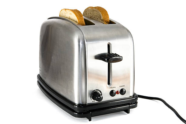 istock Shiny chrome toaster with two slices of bread 146002395