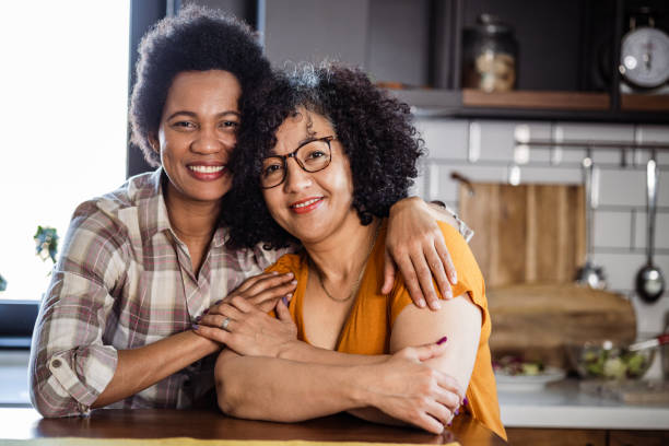 istock Two mid-aged women are in the kitchen 1460024247
