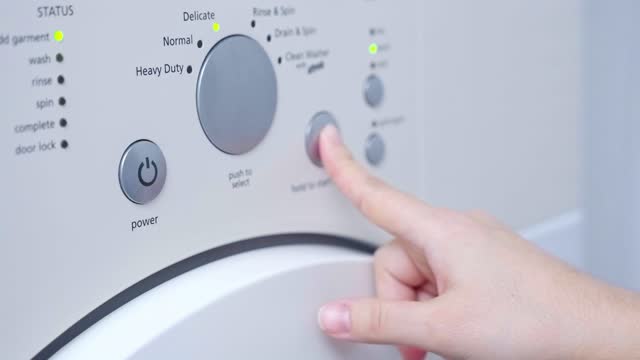 Finger press the switch to make the washing machine work.