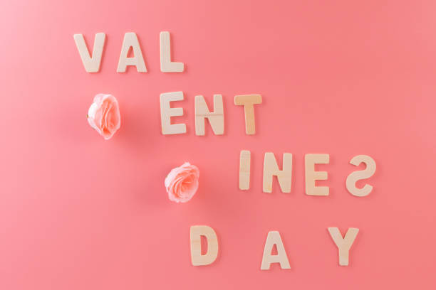 istock Text or word Valentines day with pink rose on top view for background 1460026236